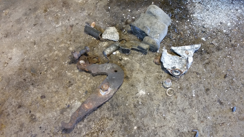 It’s a sign of... something... when the removed parts are best cleaned up with a broom. I had to drill out the pin which connected the cable/clevis to the bellcrank. On the other side, I went straight to the angle grinder.